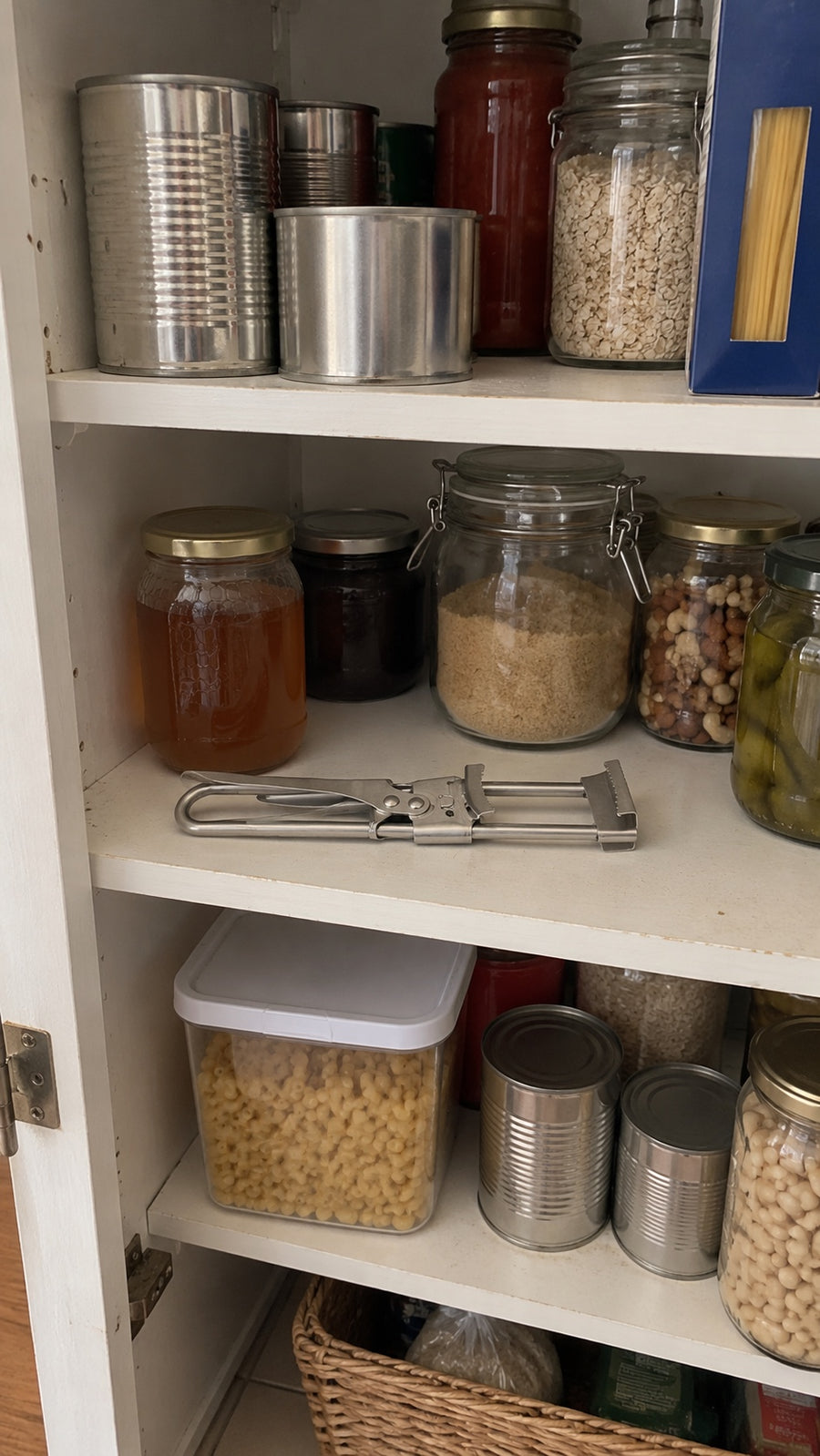Adjustable opener stored with pantry items