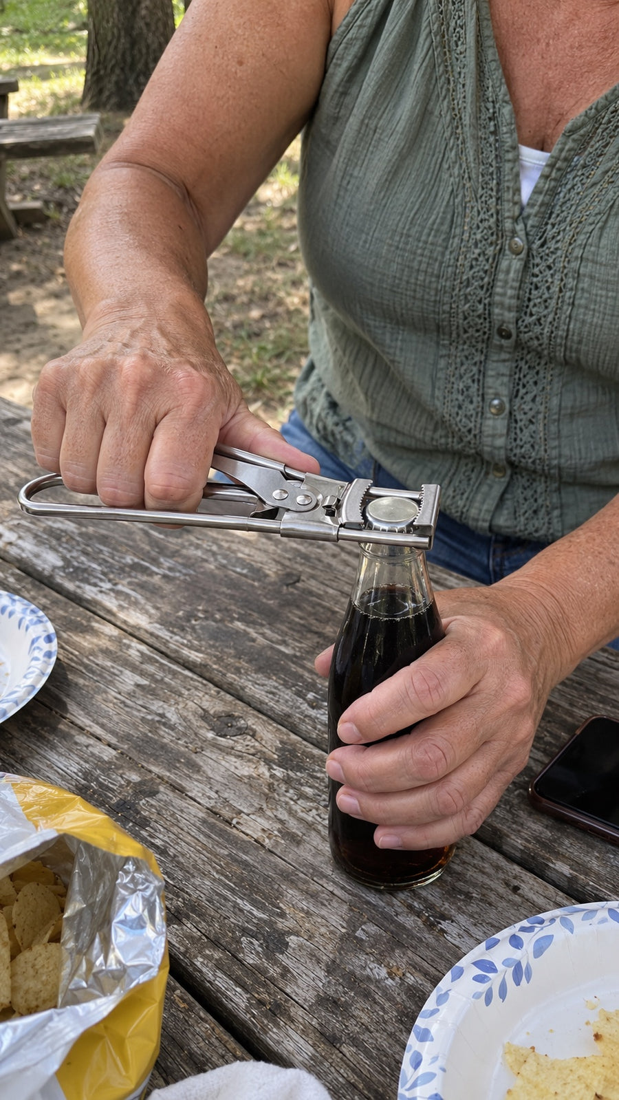 Woman using an adjustable jar opener